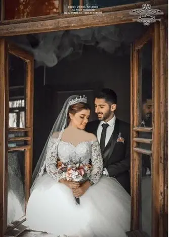 عکس عروس داماد در باغ