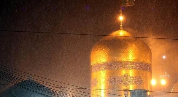 عکس حرم امام رضا در روز بارانی