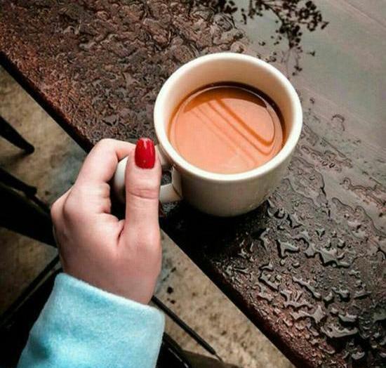 عکس قهوه در دست