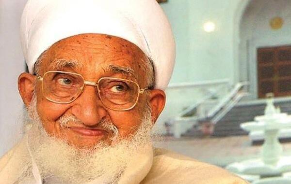 عکس امام حسین در منزل آیت الله شیخ علی کتانی