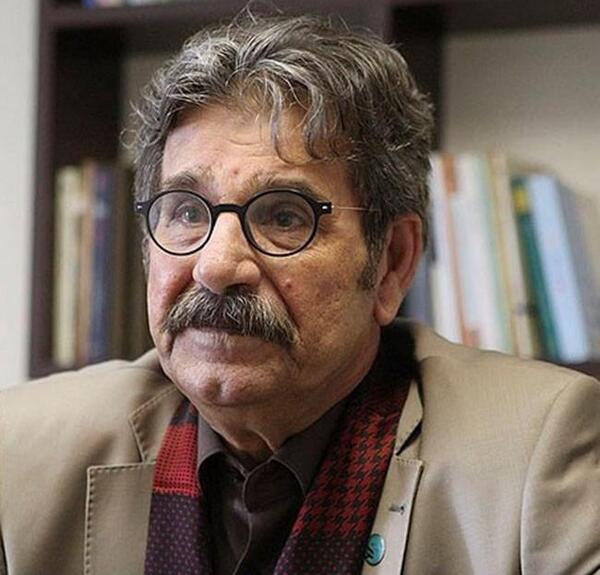 عکس عزت الله مهرآوران و همسرش