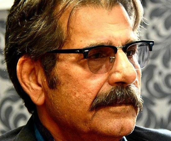 عکس عزت الله مهرآوران و همسرش