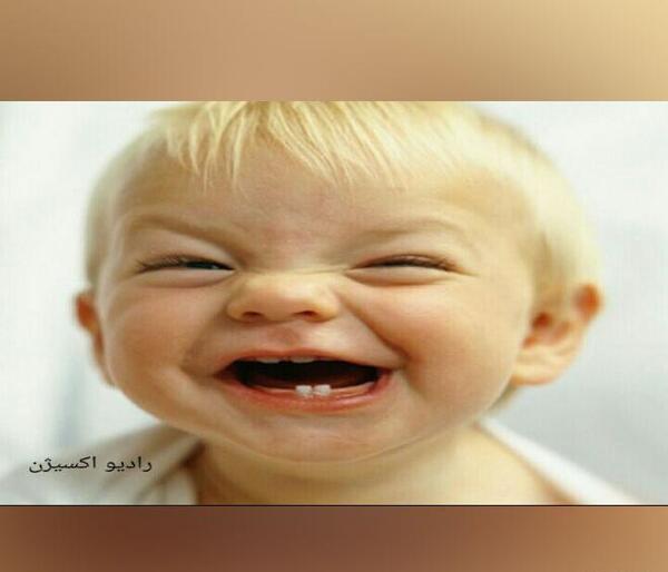 عکس خنده از ته دل بچه