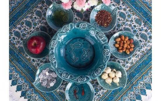 عکس تزیین سفره هفت سین با ظروف سفالی