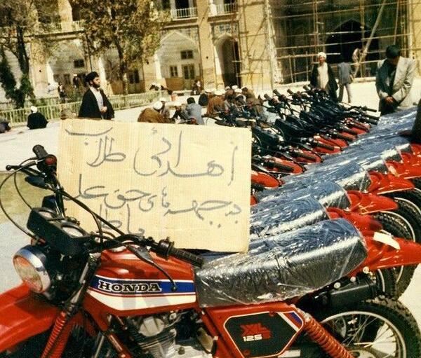 عکس شاه با موتور