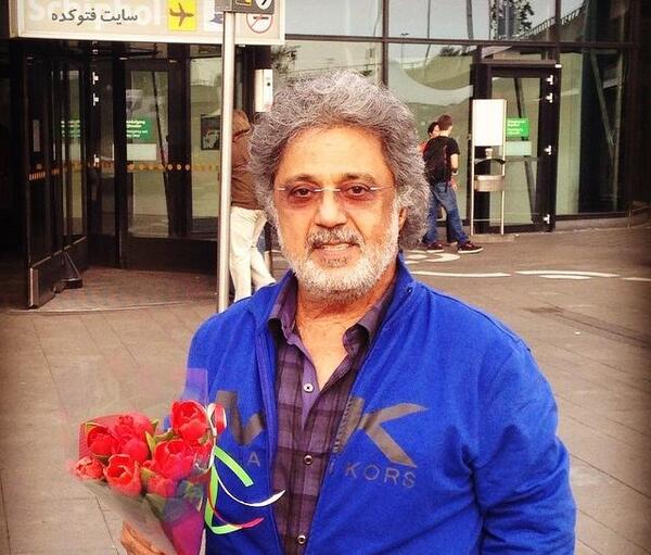 عکس داریوش خواننده با متن
