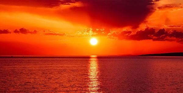 عکس غروب خورشید و دریا