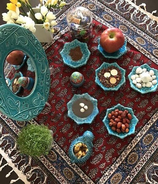 عکس سفره هفت سین روی زمین