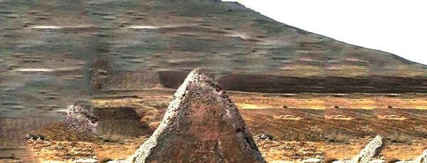 عکس خورشید روی سنگ