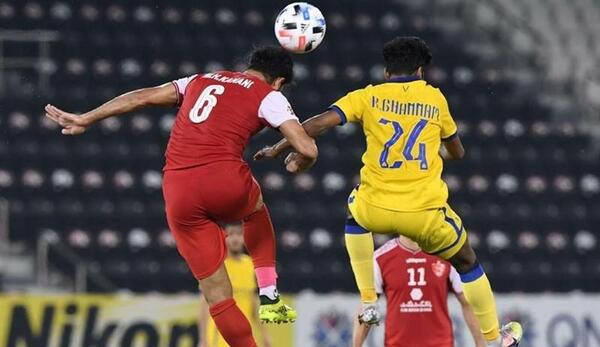 عکس داریوش اقبالی با لباس پرسپولیس