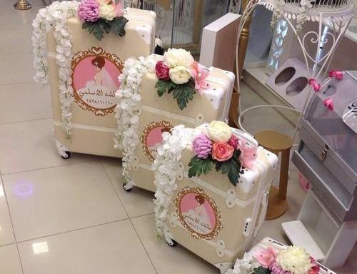 عکس ایده برای تزیین چمدان عروس و داماد