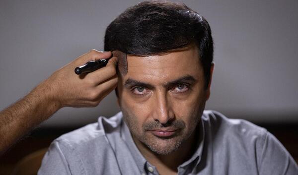 عکس امین زندگانی در خانه امن