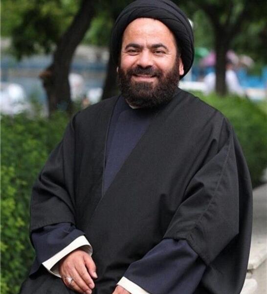 عکس حسن آقامیری با سگ