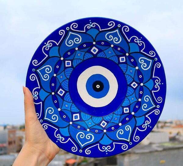 عکس دیوارکوب چشم نظر