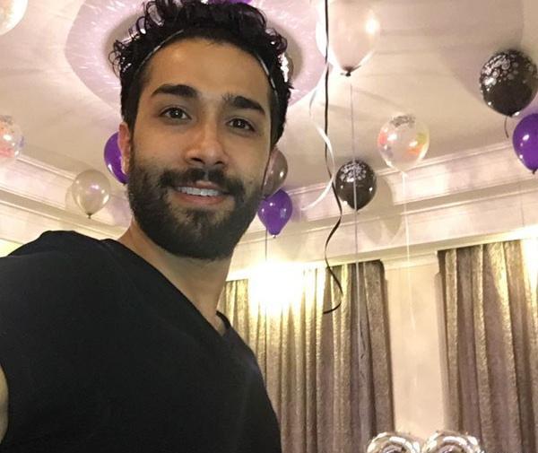 عکس حسین مهری و پسرش