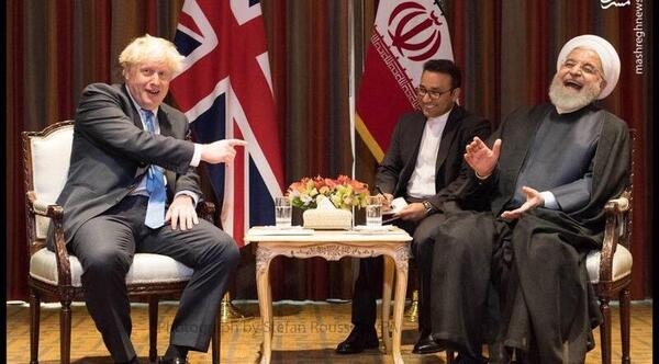 عکس خنده روحانی با جانسون