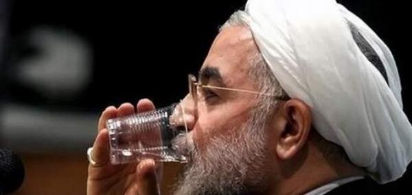 عکس خنده روحانی با جانسون