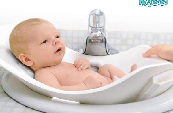 عکس نوزاد در سینک ظرفشویی
