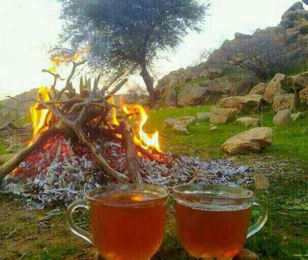 عکس دونفره کنار آتش