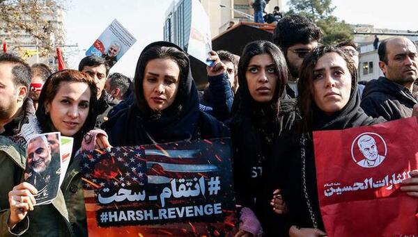 عکس حاج قاسم با دختر بی حجاب