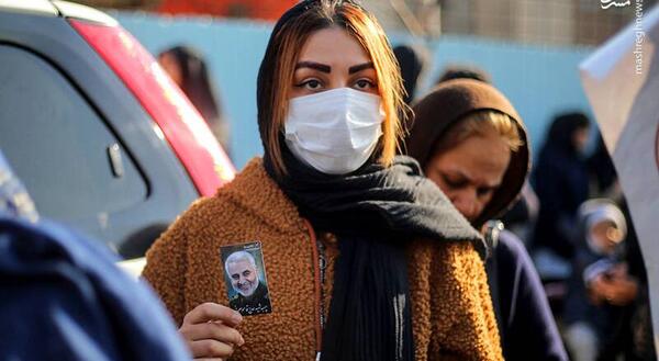عکس حاج قاسم با دختر بی حجاب