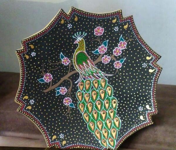 عکس طاووس در پته