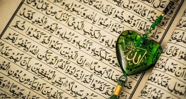 عکس قران و تسبیح و گل