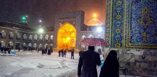 عکس حرم امام رضا در روز برفی