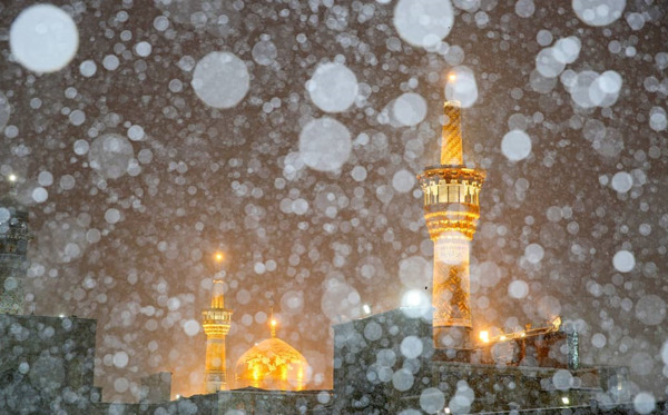 عکس حرم امام رضا در روز برفی