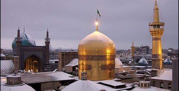 عکس حرم امام رضا در روز برفی
