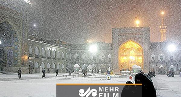 عکس حرم امام رضا در روز برفی