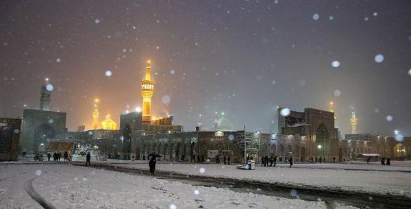 عکس حرم امام رضا در روز برفی